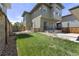 Spacious backyard with grass and gravel landscaping, offering a private outdoor retreat at 5988 N Boston St, Denver, CO 80238