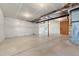 Unfinished basement with exposed beams, ready for customization and additional living space at 5988 N Boston St, Denver, CO 80238