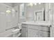 Bathroom featuring a glass enclosed shower and modern vanity at 5988 N Boston St, Denver, CO 80238