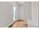 Bright entryway featuring a frosted glass door and convenient bench seating at 5988 N Boston St, Denver, CO 80238