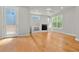 Spacious living area featuring hardwood flooring, a fireplace and recessed lighting at 5988 N Boston St, Denver, CO 80238