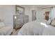 Comfortable main bedroom with a wooden dresser and neutral color scheme for relaxed ambiance at 1152 Sugarloaf Ln, Erie, CO 80516