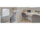 Functional upstairs landing area featuring a built-in desk space for a home office at 1152 Sugarloaf Ln, Erie, CO 80516