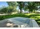 Spacious backyard with lush green grass and mature trees, perfect for outdoor activities at 5193 S Flanders Ln, Centennial, CO 80015