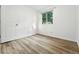 This bedroom features wood floors, bright light, and ample closet space at 5193 S Flanders Ln, Centennial, CO 80015