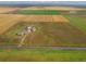 Aerial view of property surrounded by agricultural fields and open spaces at 47855 E 88Th Ave, Bennett, CO 80102