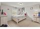 Cozy bedroom with neutral walls, plush carpet, a comfortable bed, and a window providing natural light at 47855 E 88Th Ave, Bennett, CO 80102