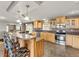 Charming kitchen featuring a large island, stainless steel appliances, and ample counter space at 47855 E 88Th Ave, Bennett, CO 80102