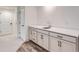 Modern wet bar with cabinetry and quartz countertops in the basement at 960 Superior Dr, Superior, CO 80027