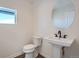 Clean and modern powder room with pedestal sink and updated fixtures at 960 Superior Dr, Superior, CO 80027
