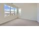 Spacious bedroom featuring large windows and neutral carpeting at 960 Superior Dr, Superior, CO 80027
