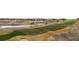 Aerial image of the neighborhood showing the golf course and ponds at 27596 E Jamison Cir, Aurora, CO 80016