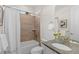 Well-maintained bathroom featuring tile shower, granite vanity, and neutral colors at 27596 E Jamison Cir, Aurora, CO 80016