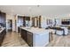 Spacious kitchen with modern appliances, center island, and sleek countertops at 1350 Loraine N Cir, Lafayette, CO 80026