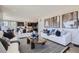 Spacious living room with modern decor open to the gourmet kitchen at 1350 Loraine N Cir, Lafayette, CO 80026