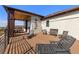 Relaxing deck with mountain views and lounge chairs at 1708 Creedmoor Ct, Castle Rock, CO 80109