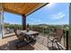 Deck with scenic mountain views and outdoor seating at 1708 Creedmoor Ct, Castle Rock, CO 80109