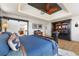 Main bedroom with ensuite bathroom and mountain views at 1708 Creedmoor Ct, Castle Rock, CO 80109