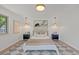 Well-lit bedroom with modern decor, stylish lighting, and a neutral color scheme at 41 Eagle Dr, Littleton, CO 80123