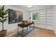 Bright office with built-in shelving and modern desk at 41 Eagle Dr, Littleton, CO 80123