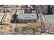 Birds eye view shows this brick building, set on grounds with mature trees at 2034 Dahlia St # 1, Denver, CO 80207