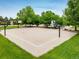 Community basketball court surrounded by lush greenery and trees on a sunny day at 2777 W 106Th Cir, Denver, CO 80234