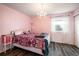 Bedroom with wood floors and natural light at 2777 W 106Th Cir, Denver, CO 80234