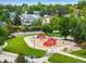Community playground in neighborhood featuring colorful play structures and surrounding landscaping at 2777 W 106Th Cir, Denver, CO 80234