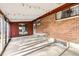 Covered patio area is ideal for outdoor living at 7875 Cyd Dr, Denver, CO 80221