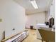 The spacious laundry room offers utility sink, washing machine and dryer hookups, and storage at 3825 S Peach Way, Denver, CO 80237