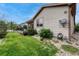 Well-maintained backyard includes a deck, lush lawn, and mature landscaping at 19382 Dunraven St, Parker, CO 80134