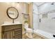 Modern bathroom features a glass-enclosed shower, updated fixtures, and stylish vanity at 19382 Dunraven St, Parker, CO 80134