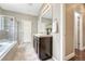Bathroom includes a vanity, a shower, and stylish fixtures at 19382 Dunraven St, Parker, CO 80134