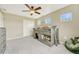 Bedroom with a spacious closet, custom bunk bed, carpeted floors, and lots of natural light at 19382 Dunraven St, Parker, CO 80134