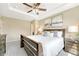 Bedroom boasts a tray ceiling, large window, and a well-coordinated design at 19382 Dunraven St, Parker, CO 80134