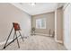 Bright bedroom offers a comfortable space with carpet, a window, and closet for storage at 19382 Dunraven St, Parker, CO 80134