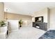 Open loft area with neutral walls, carpet, and white railings overlooking the lower level at 19382 Dunraven St, Parker, CO 80134