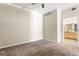 Neutral bedroom featuring clean walls, neutral carpet and ensuite bathroom at 1440 Little Raven St # 110, Denver, CO 80202