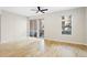 Open-concept room with bright natural light and hardwood floors at 1440 Little Raven St # 110, Denver, CO 80202