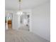 Cozy dining room with open layout to staircase and kitchen at 11191 W Crestline Dr, Littleton, CO 80127
