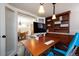 Charming office features built-in shelving and views into the dining room at 569 S Race St, Denver, CO 80209