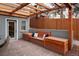 Relaxing backyard patio with built-in bench seating and pergola at 569 S Race St, Denver, CO 80209