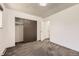 Neutral bedroom featuring a closet, plush carpet and white walls at 11310 W 46Th Ave, Wheat Ridge, CO 80033