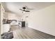 Spacious kitchen with stainless appliances and adjacent laundry area offering convenience at 11310 W 46Th Ave, Wheat Ridge, CO 80033