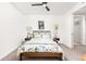 Inviting bedroom showcases a comfortable bed, stylish decor, and a relaxing ambiance at 1750 Wewatta St # 1230, Denver, CO 80202