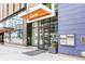 Street view of the entrance to a luxury apartment building at 1750 Wewatta St # 1230, Denver, CO 80202