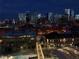 Stunning night view of city skyline with illuminated buildings at 1750 Wewatta St # 1230, Denver, CO 80202