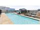 Relax by this rooftop pool with tanning ledge and lounge seating, perfect for enjoying warm weather and city views at 1750 Wewatta St # 1230, Denver, CO 80202