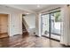 Cozy living room showing staircase and sliding glass doors leading to outdoor deck at 9605 E Kansas Cir # 53, Denver, CO 80247