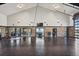 Large, well-equipped gym space with high ceilings, mirrored wall, and abundant natural light at 6502 & 6200 Kiva Ridge Dr, Berthoud, CO 80513